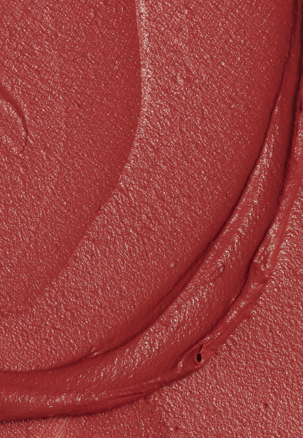 Yolaine Paris Daphné lipstick, a natural red with a velvety matte finish, perfect for a subtle pop of color.