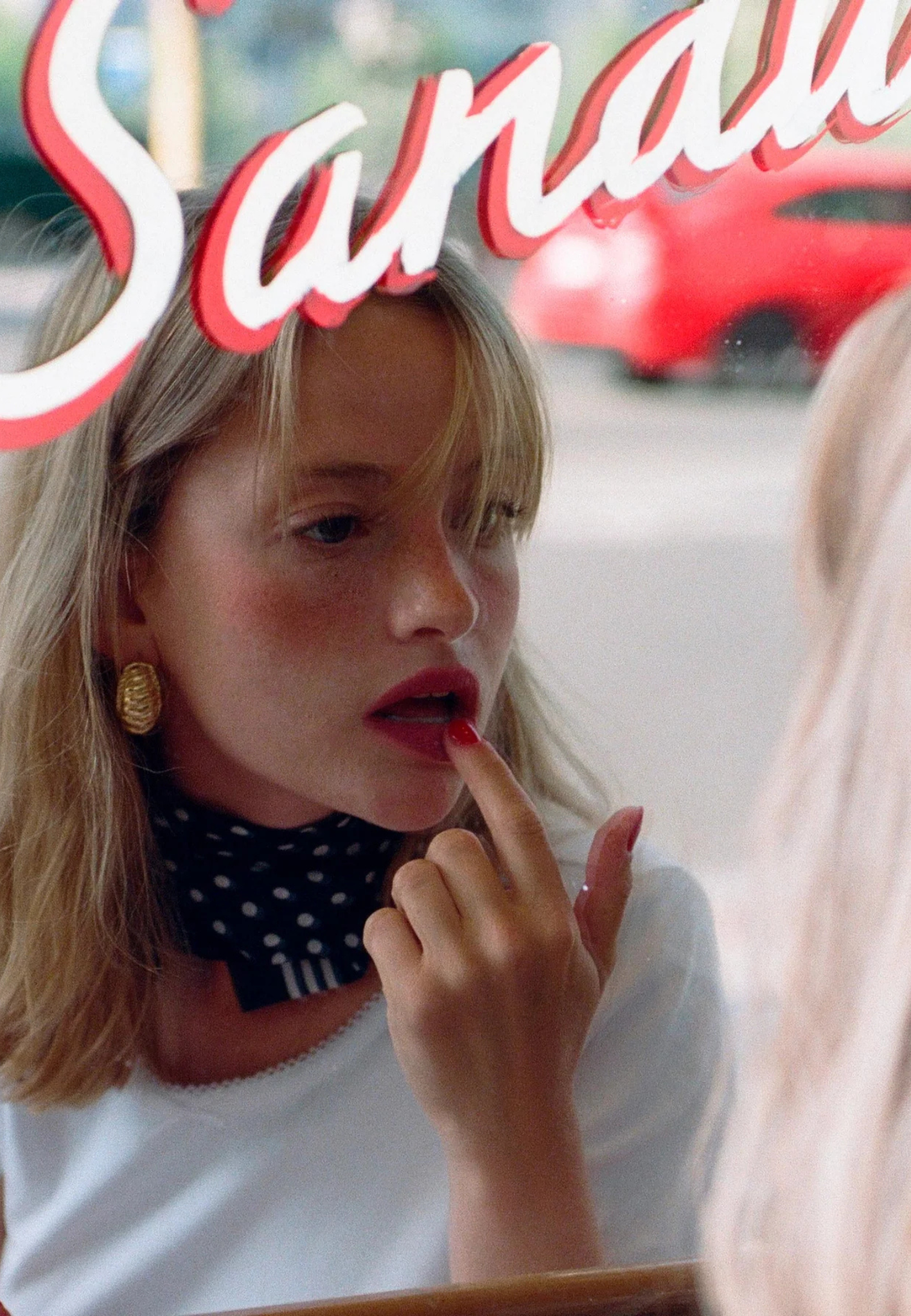 Yolaine Paris Garance Mousse de Rouge lipstick in an iconic red, offering a creamy, velvety matte finish.