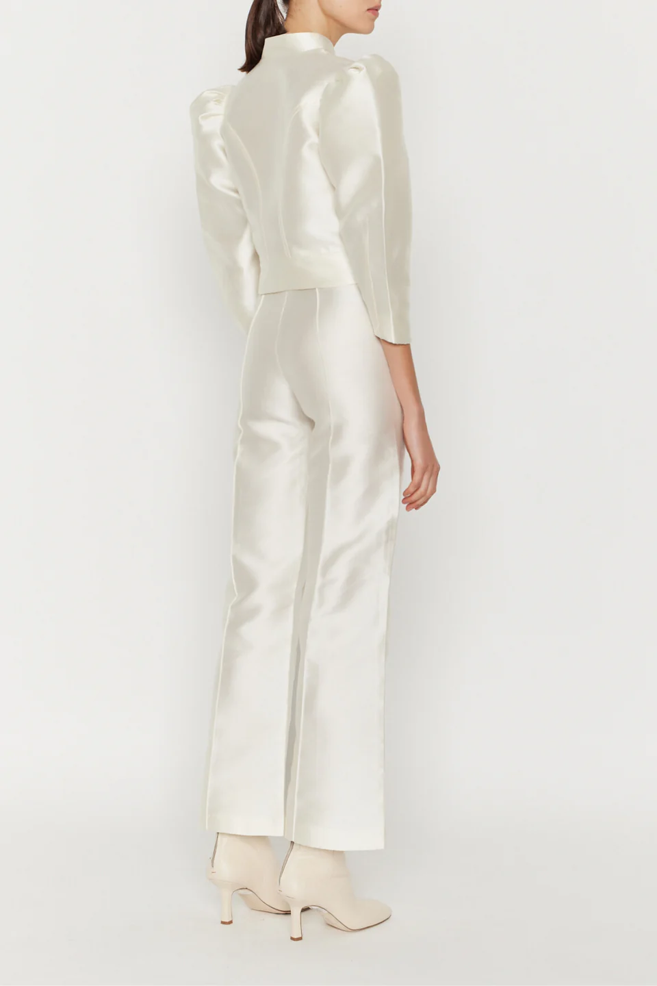 Destree off-white flare pants featuring a high-waisted silhouette, straight flared cut, and chic cropped length.