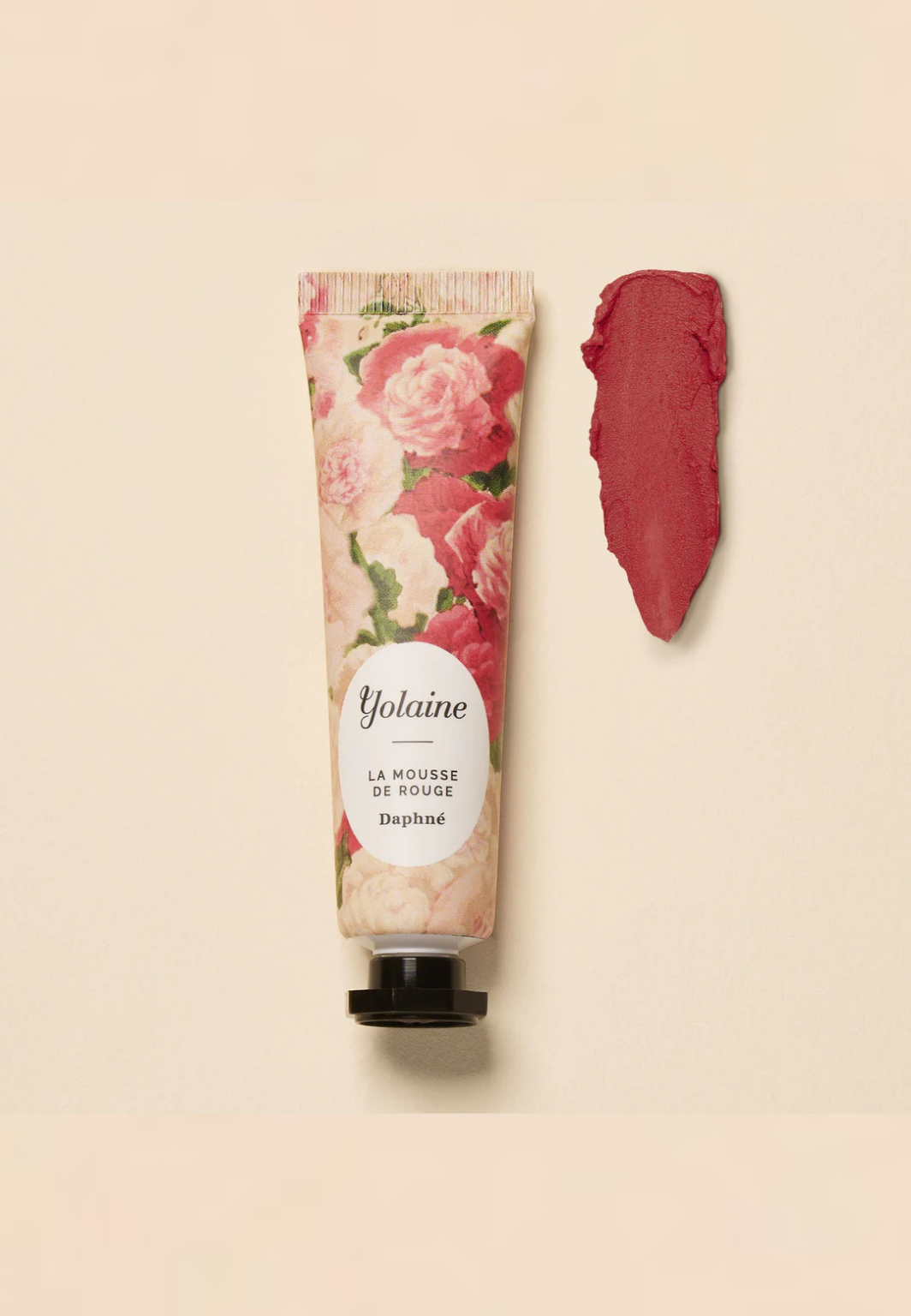 Vegan Daphné Mousse de Rouge by Yolaine Paris, a creamy red lipstick that doubles as a blush for radiant cheeks.