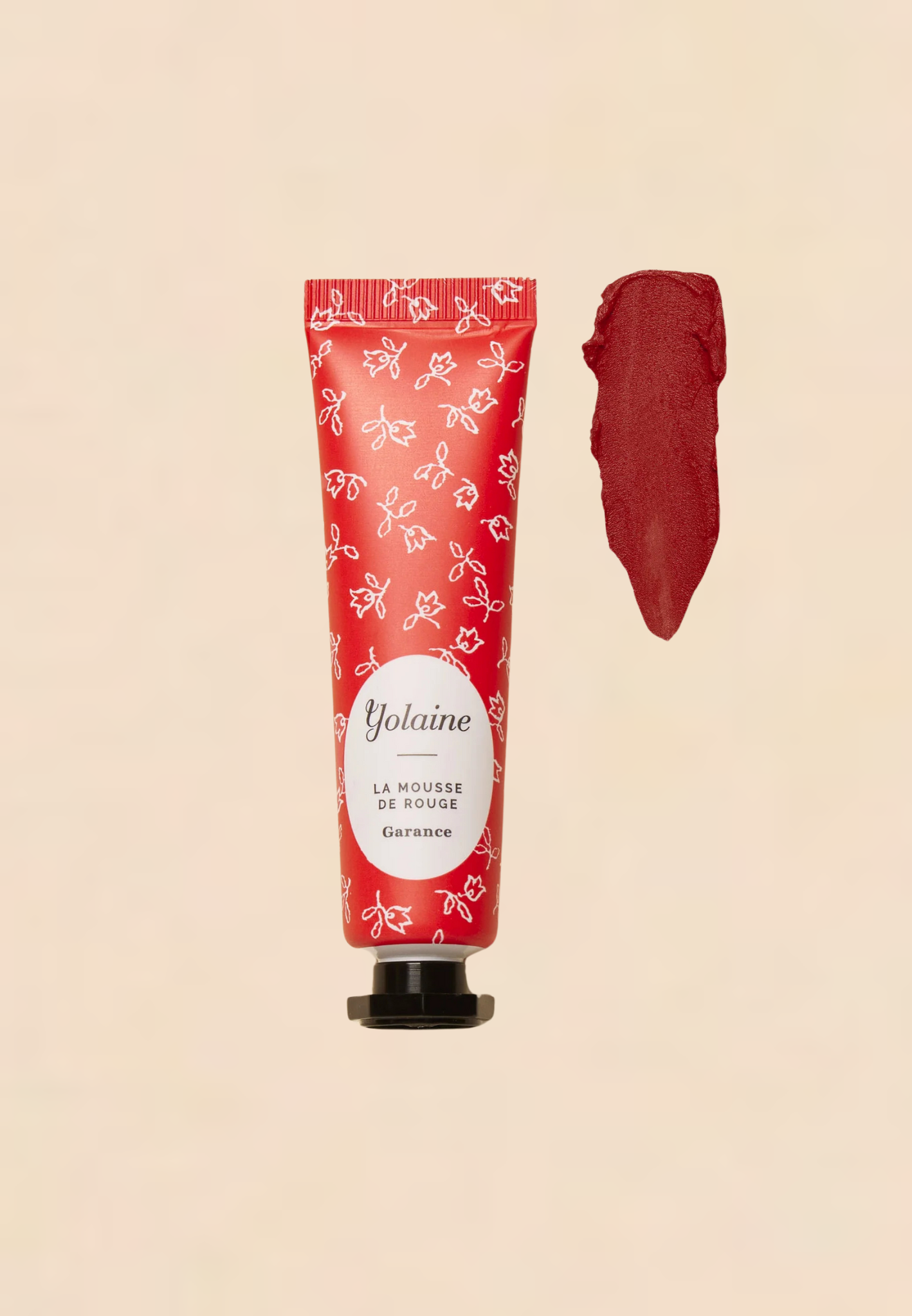 Iconic Garance Mousse de Rouge by Yolaine Paris, a creamy red lipstick with a velvety matte finish that lasts all day.
