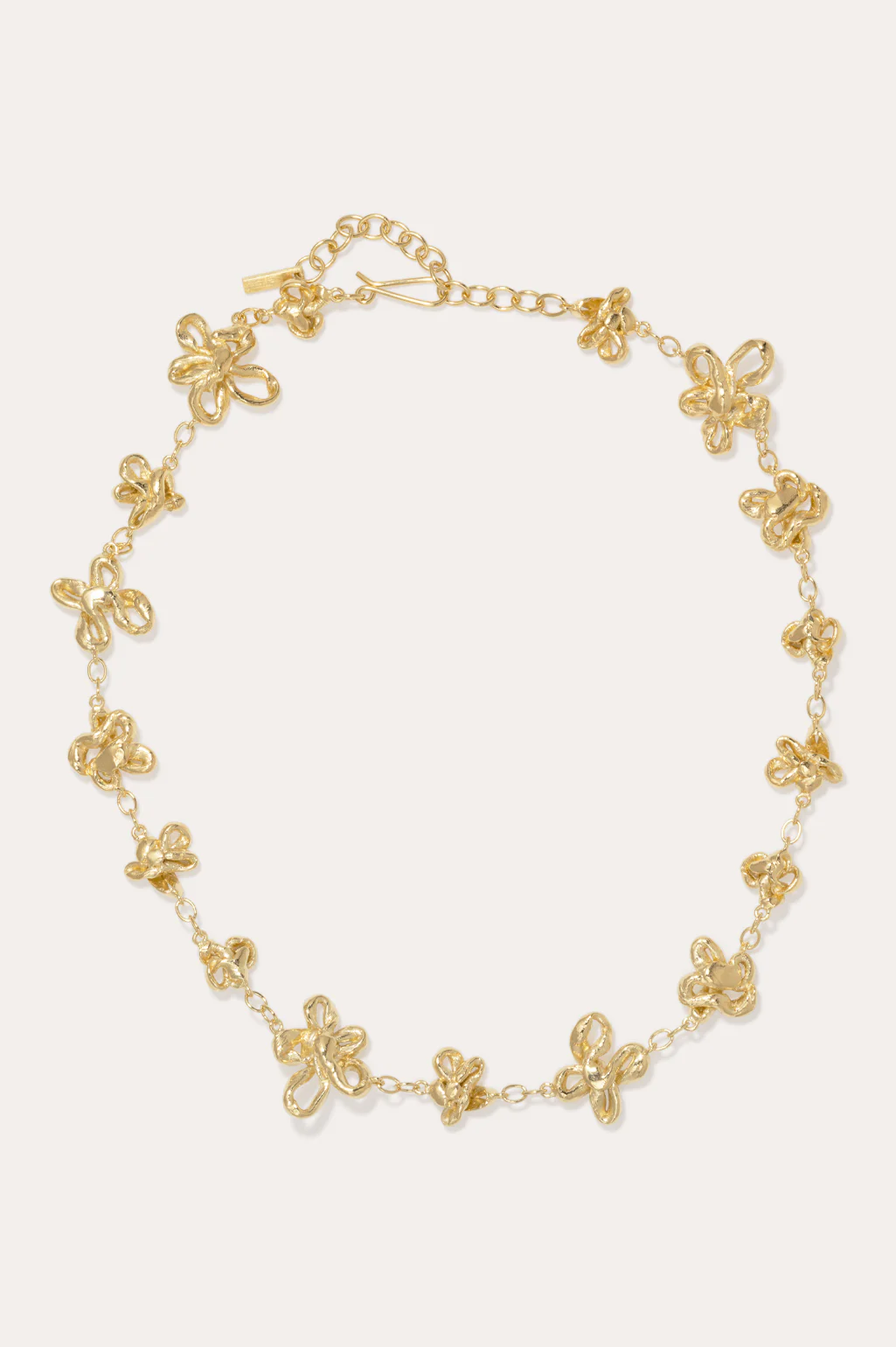 Sophisticated 18ct gold-plated necklace featuring a delicate flower chain, perfect for layering.