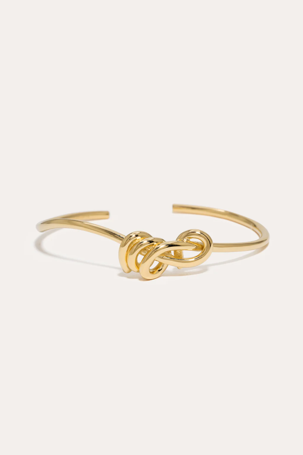 Completedworks bracelet with a delicate knotted design in 18ct yellow gold plating, adding sophistication to any look.