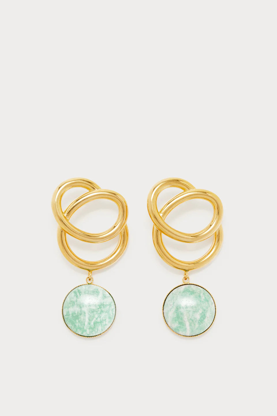 Gold plated earrings with interlocking rings and round light blue stone pendant